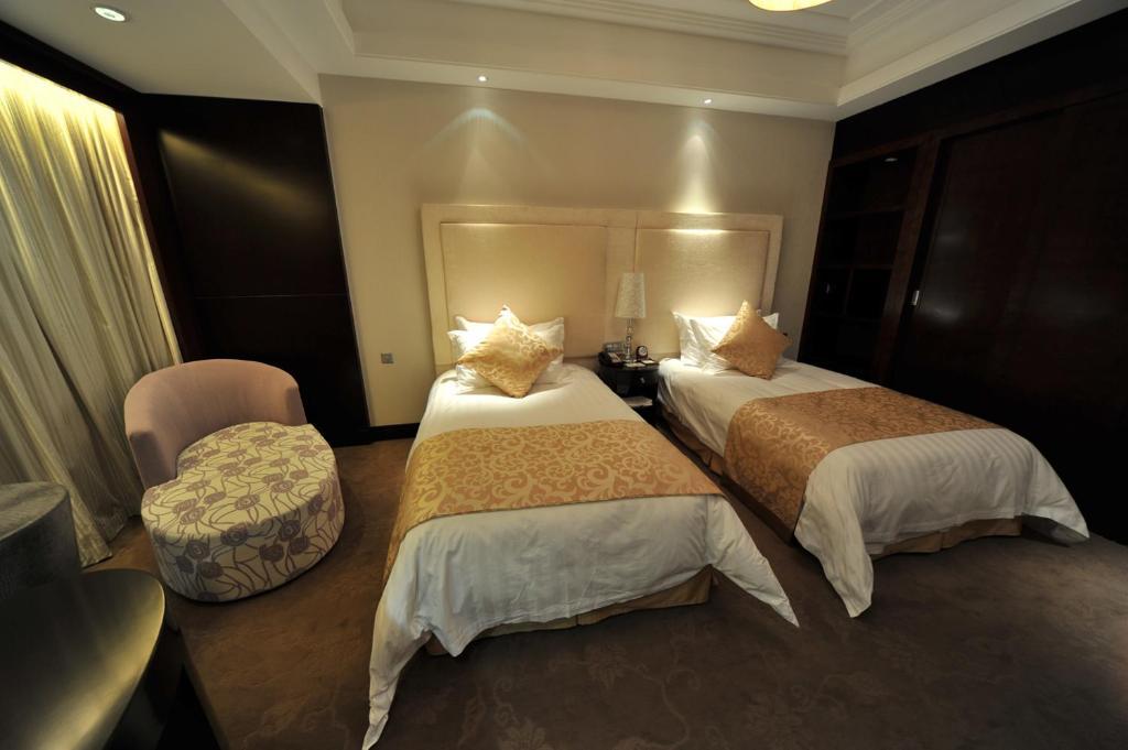 S&N Dalian Hotel Стая снимка